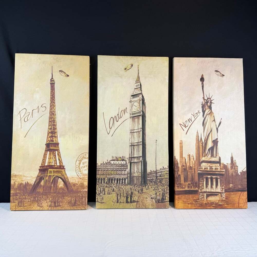 Three vintage-style canvas wall art panels Paris London New York sepia